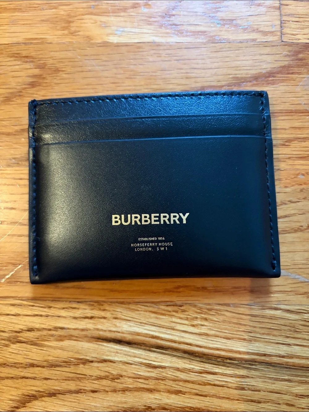 Never used! Brand New! Burberry Black Leather Card & Key Sleeve with Gold Logo
